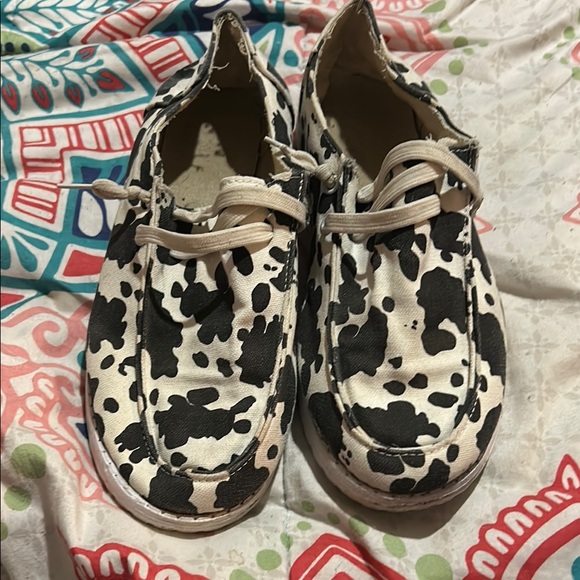 Black and White Cow Print Slip-On Moccasins - Picture 1 of 3
